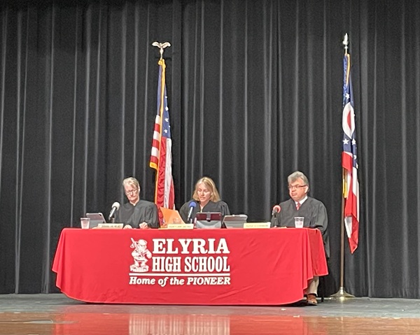 Judges sitting at bench