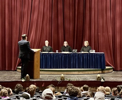 Judges sitting at bench
