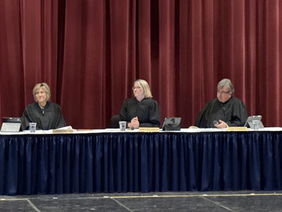 Judges sitting at bench